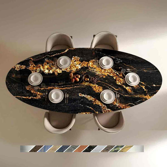 Ovaler Esstisch Novalis mit Magna Black Gold Granit, tiefschwarzer Naturstein mit goldfarbenen Wolkungen und feinen Bänderungen in exklusiver Natursteinoptik.